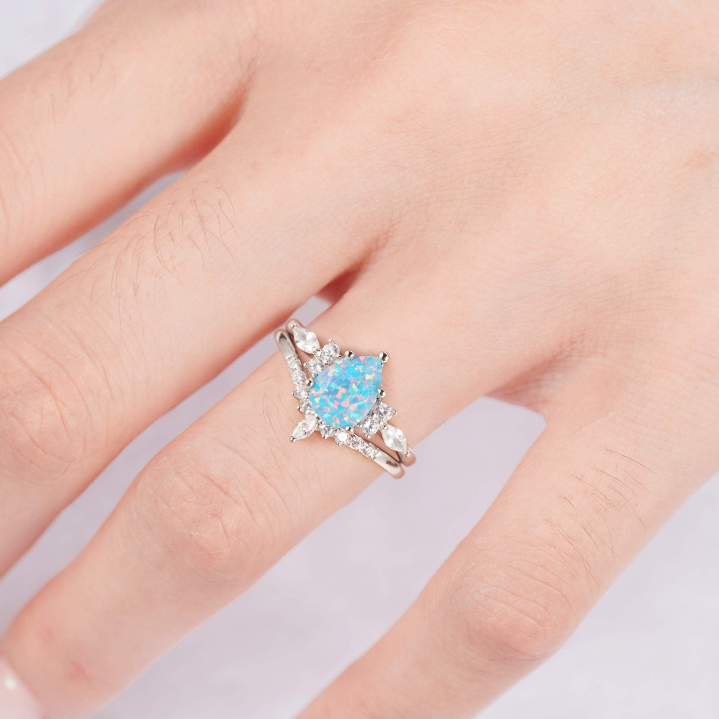 Blue fire opal ring with sterling silver band and crystals