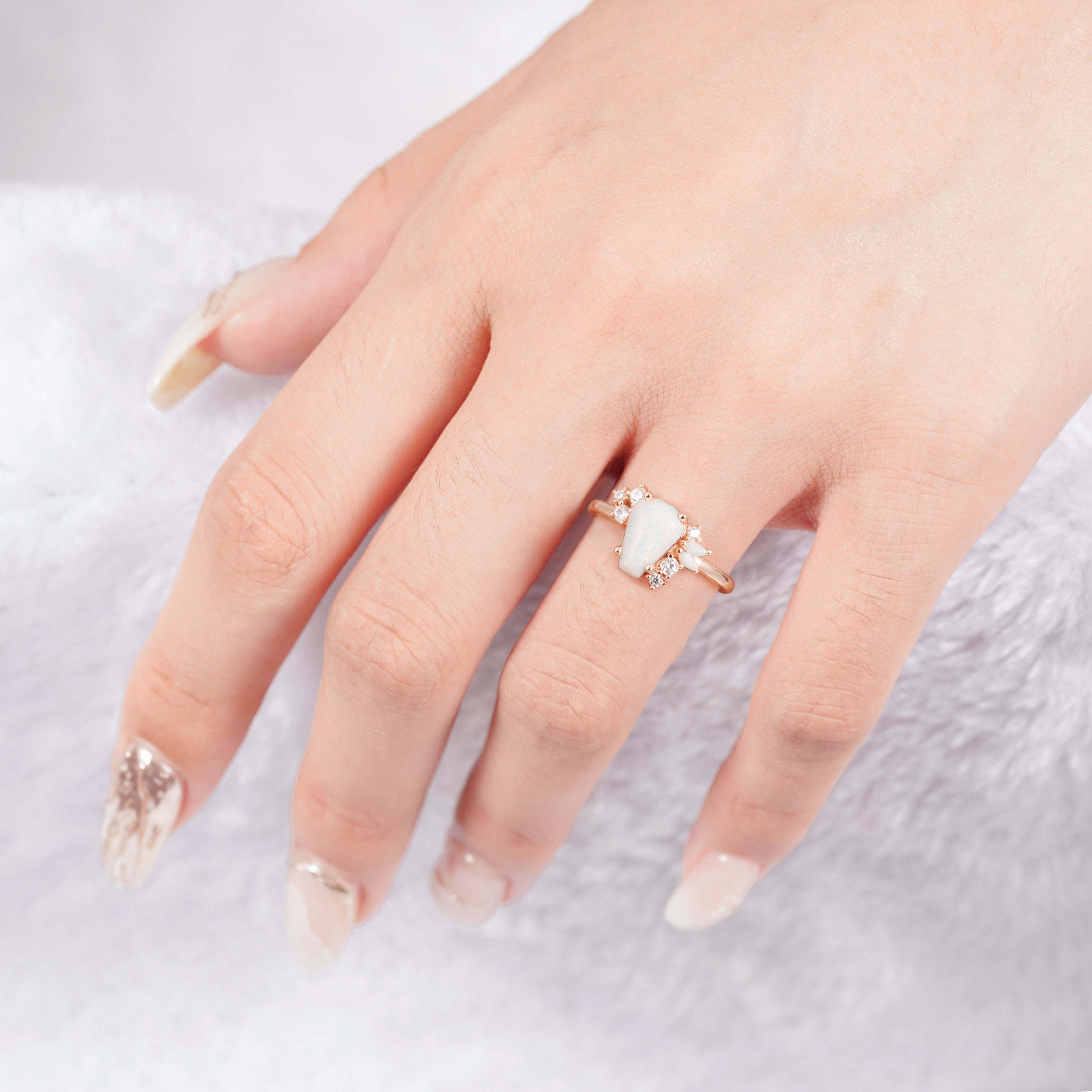 Coffin-cut opal ring in rose gold with moissanite accents