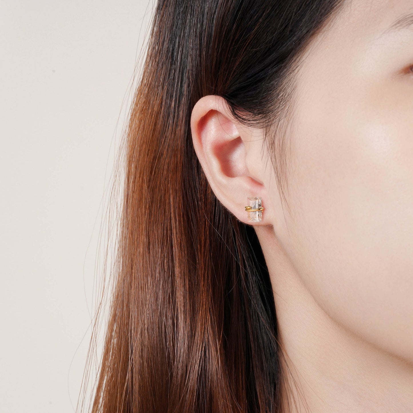Salt and pepper diamond earrings with emerald cut design