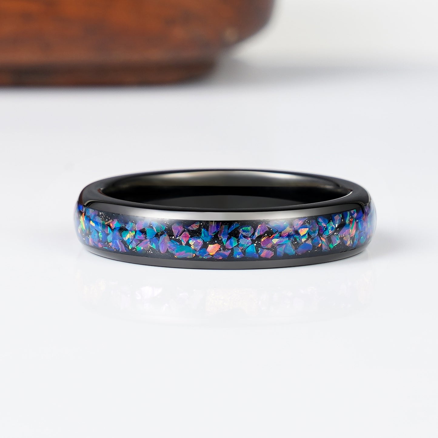 Tungsten ring with opal and cosmic gemstone details