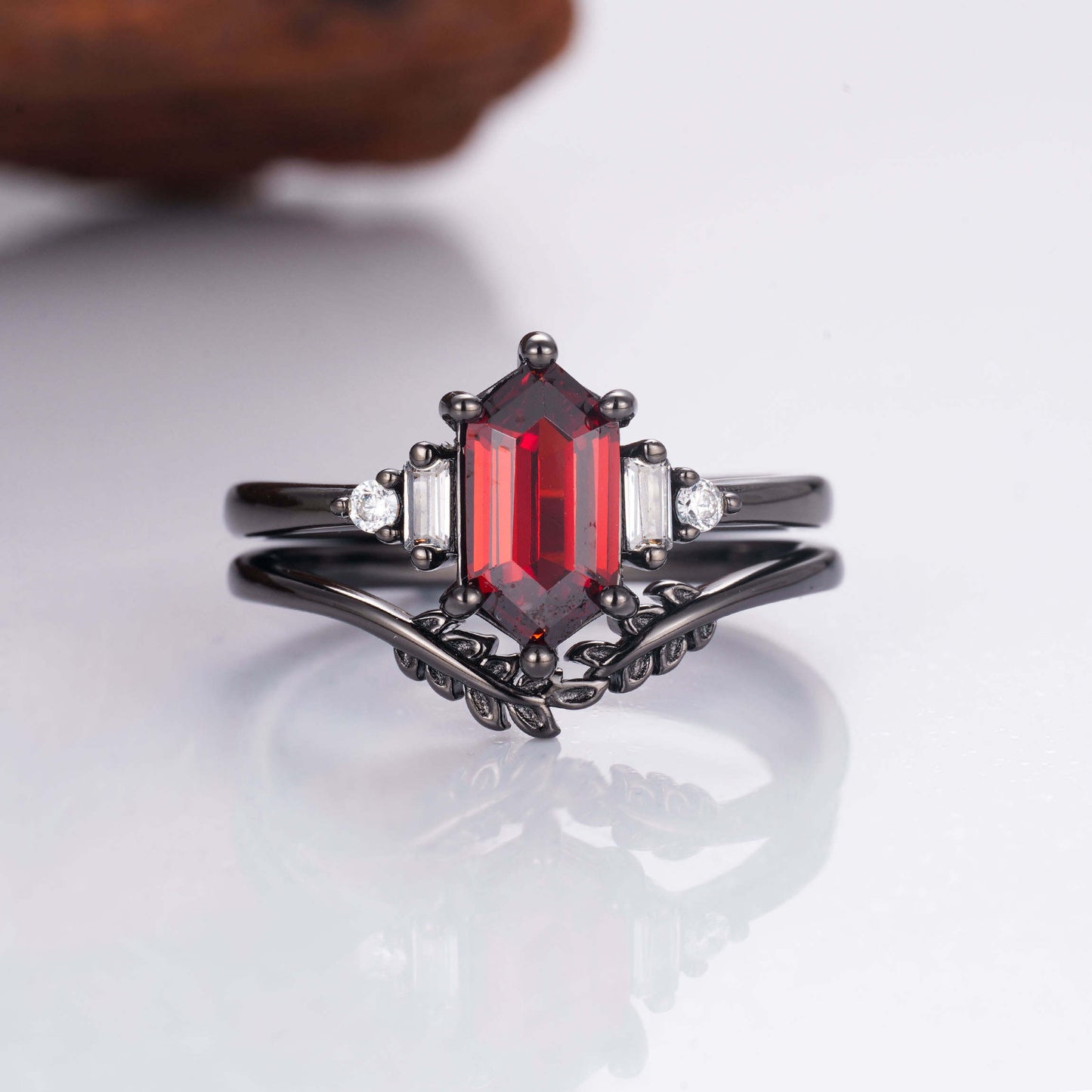 Garnet ring with black gold vermeil and gold leaf design