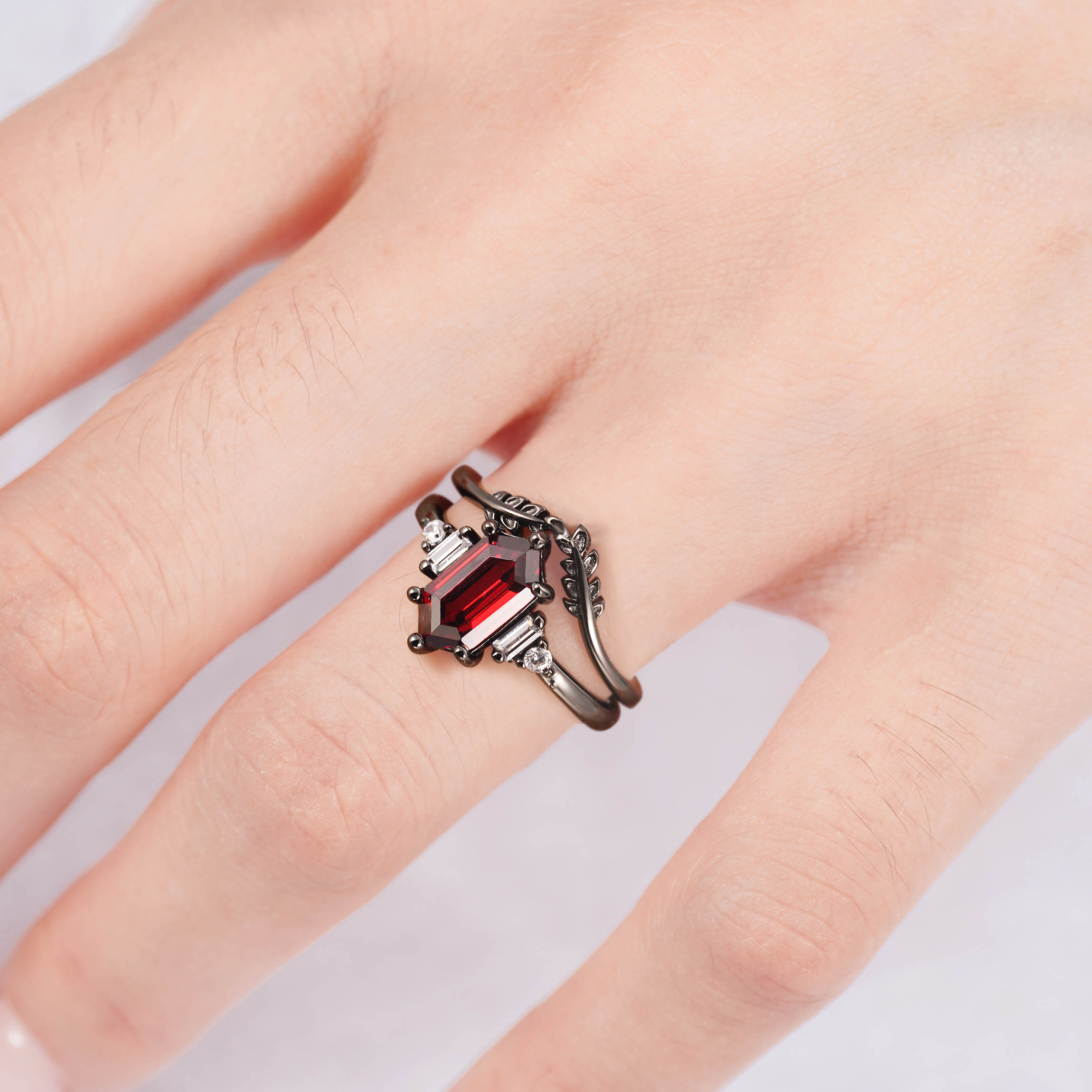 Garnet ring with black gold vermeil and gold leaf design