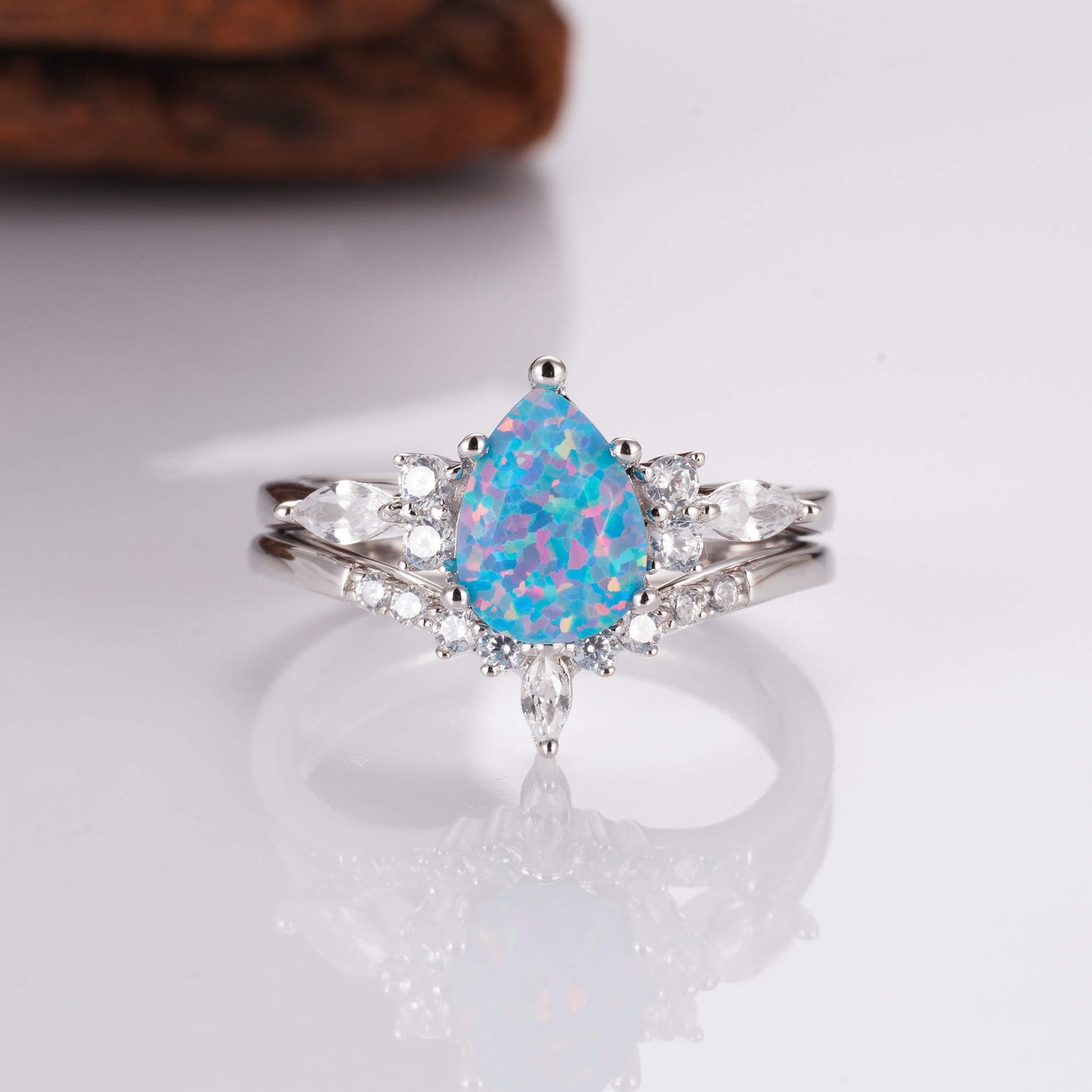 Blue fire opal ring with sterling silver band and crystals