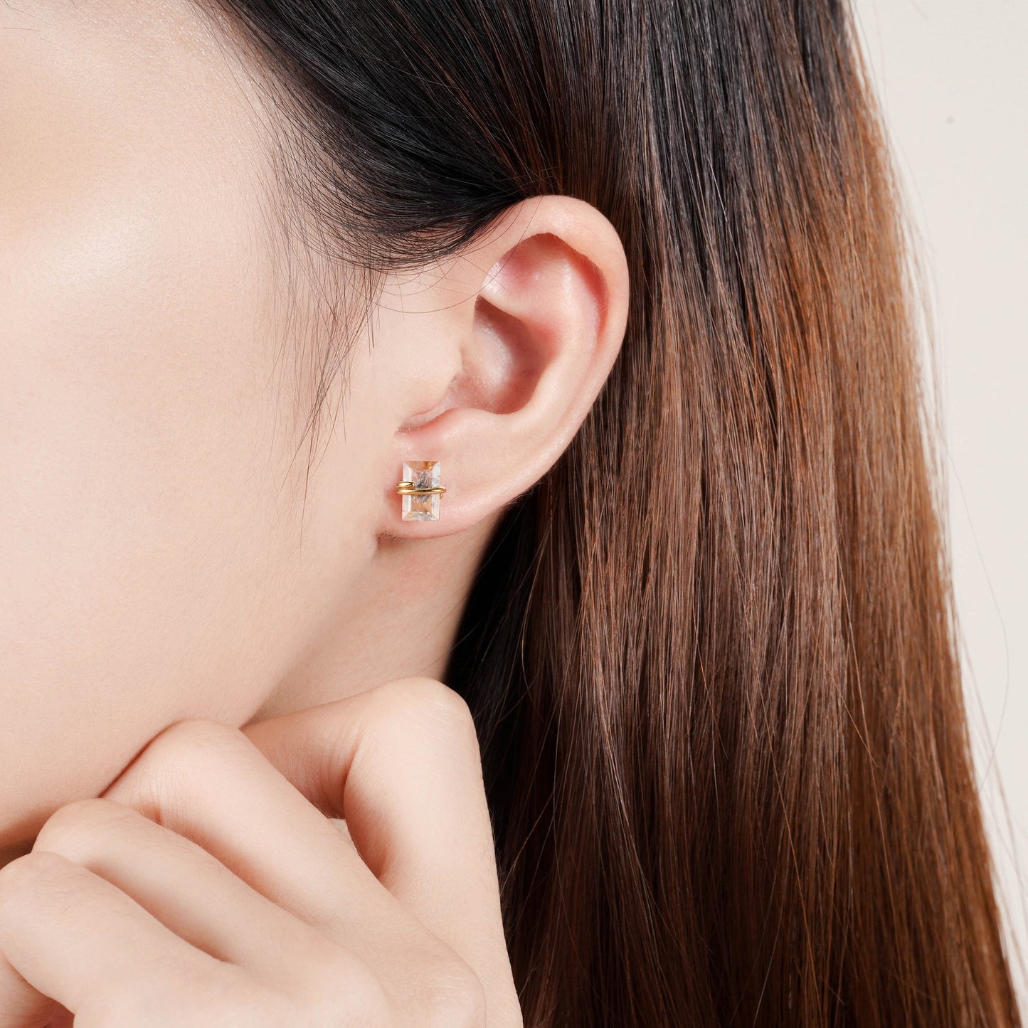 Salt and pepper diamond earrings with emerald cut design