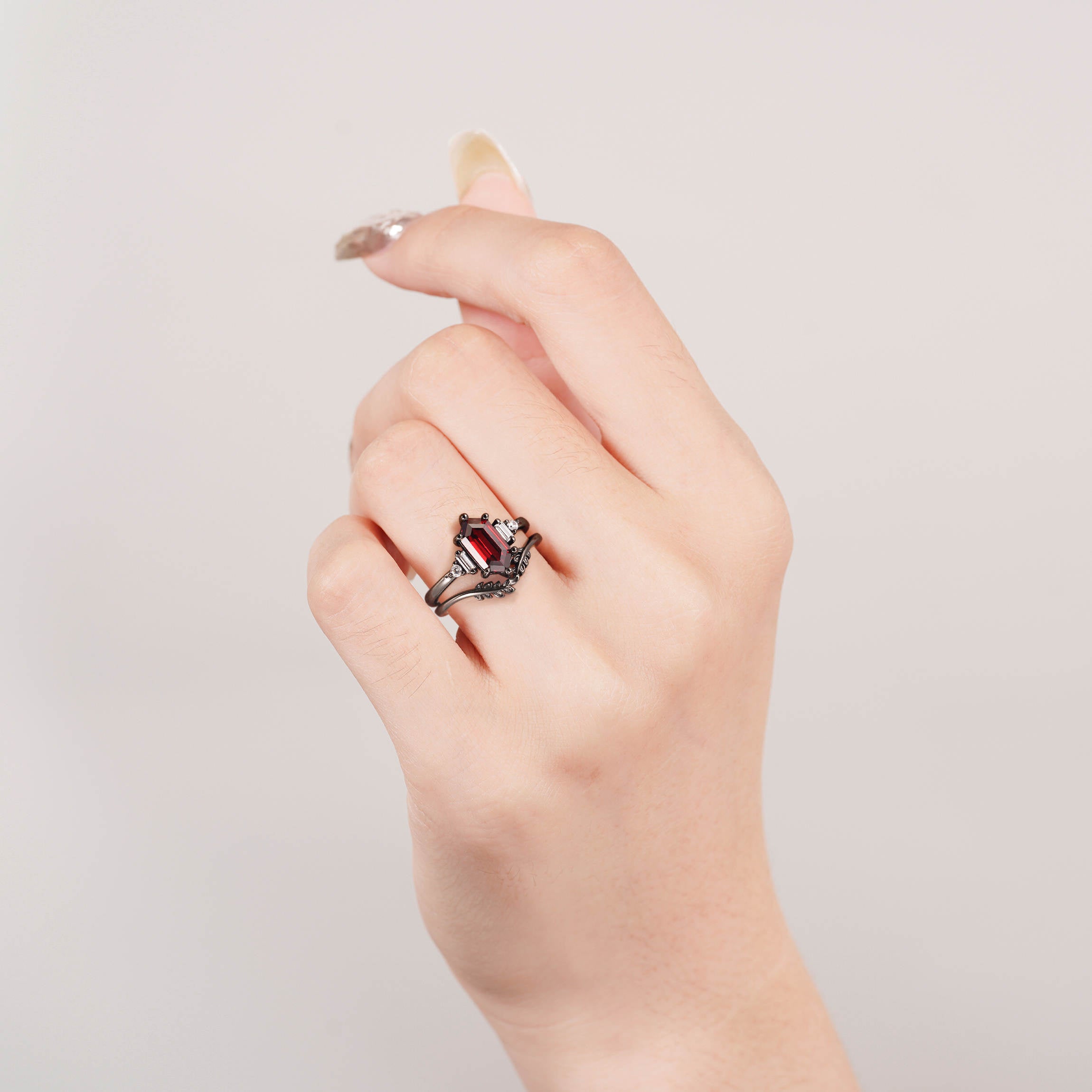 Garnet ring with black gold vermeil and gold leaf design