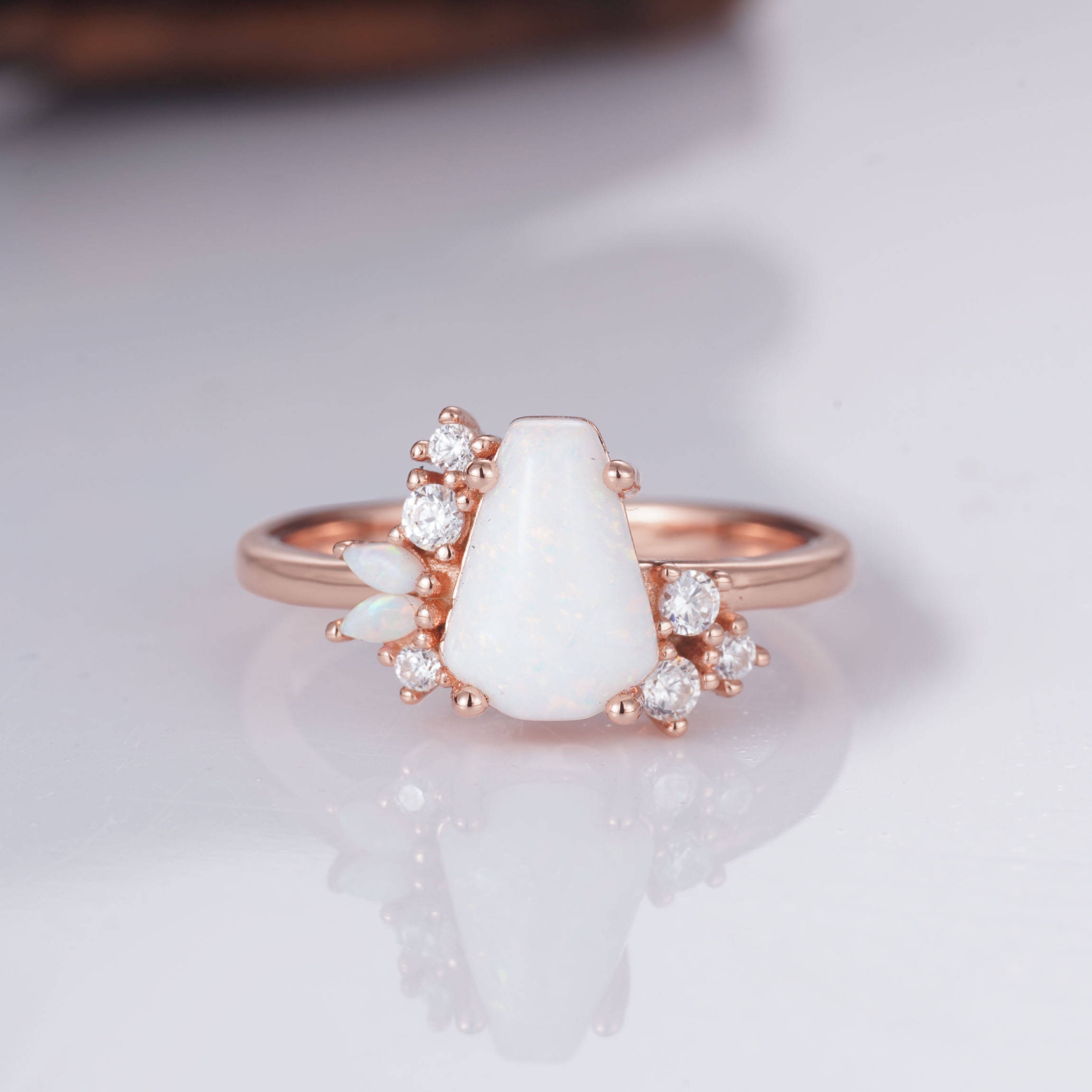 Coffin-cut opal ring in rose gold with moissanite accents