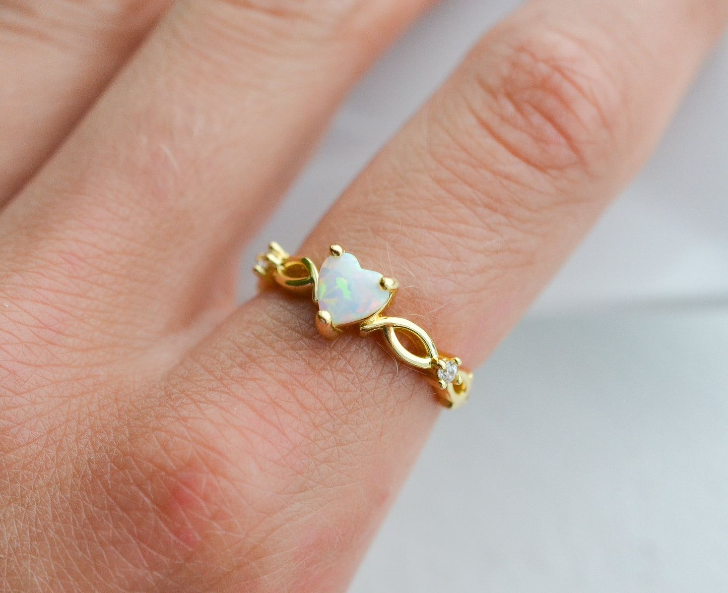 Sterling silver opal ring with heart-shaped gemstone