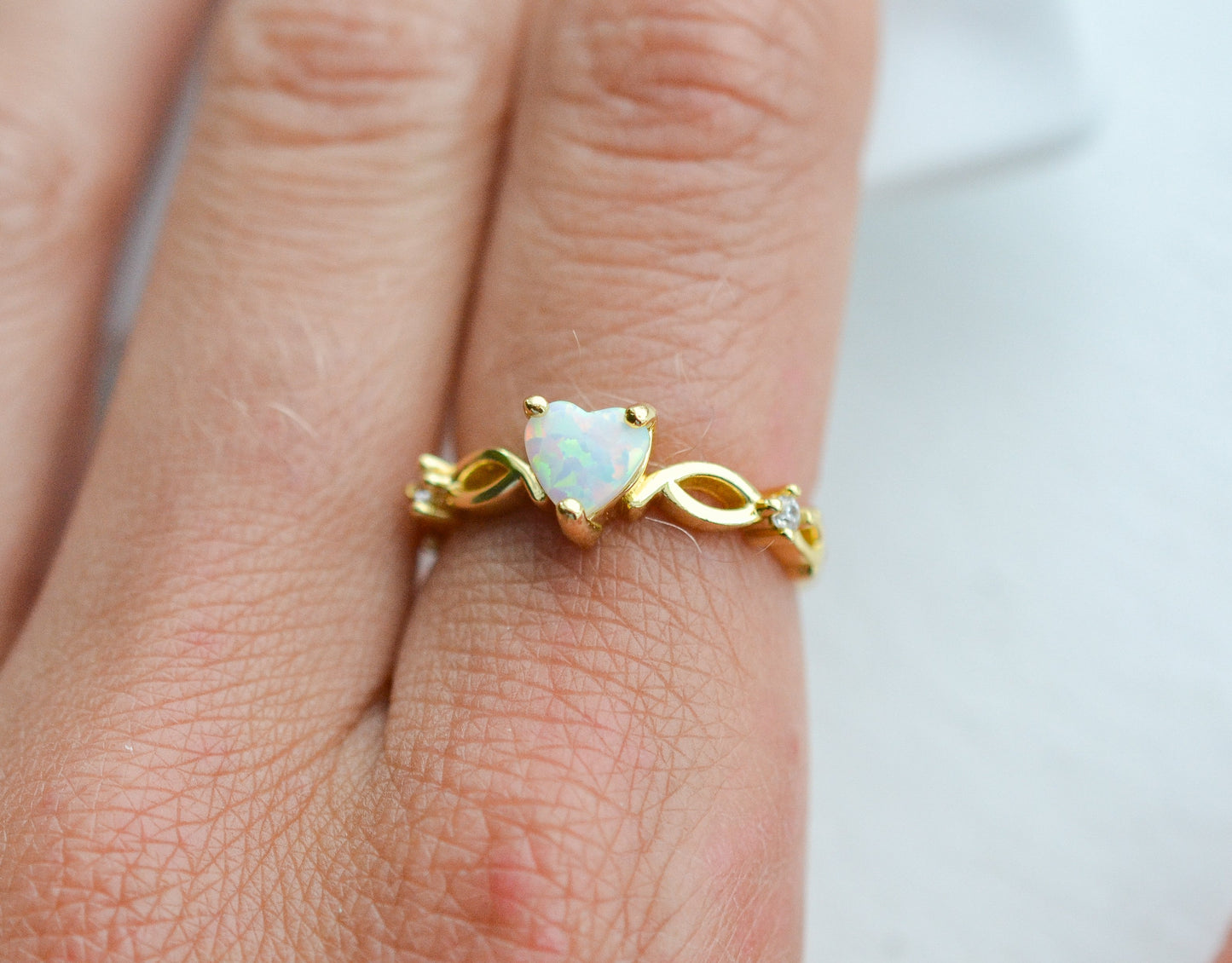 Sterling silver opal ring with heart-shaped gemstone