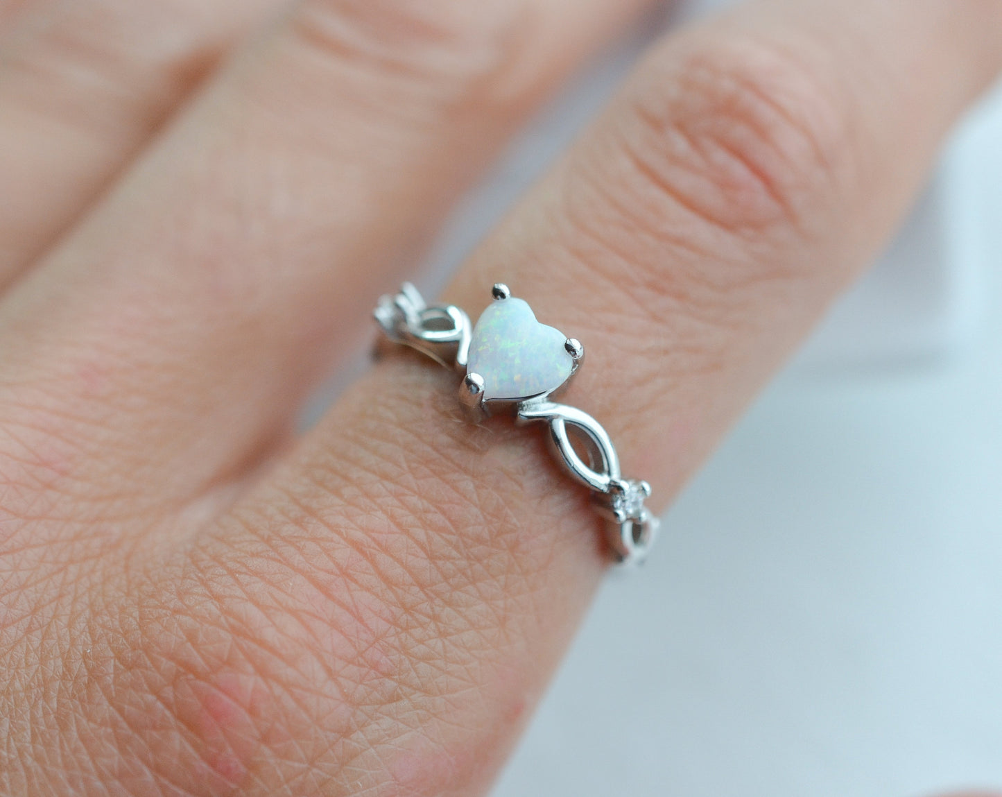 Sterling silver opal ring with heart-shaped gemstone