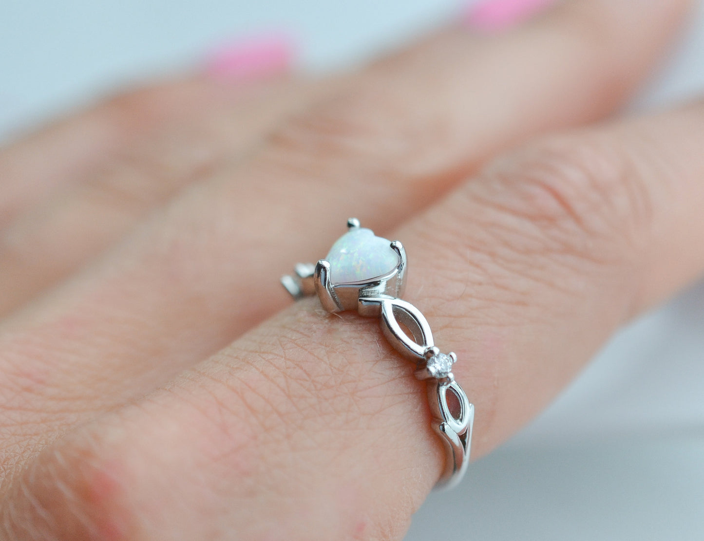 Sterling silver opal ring with heart-shaped gemstone