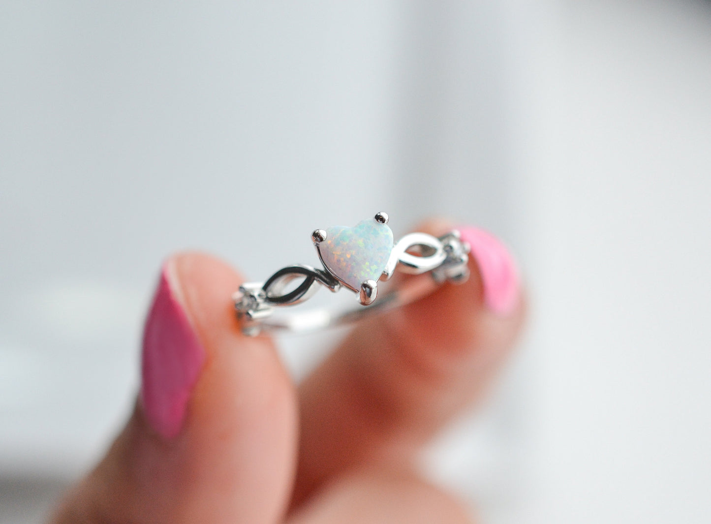 Sterling silver opal ring with heart-shaped gemstone