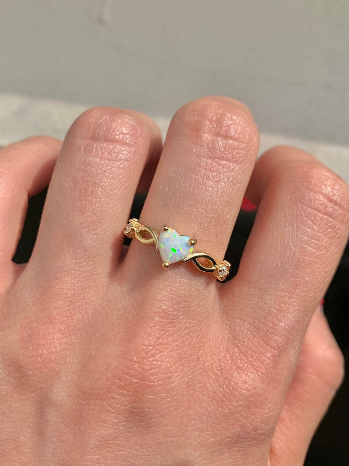 Sterling silver opal ring with heart-shaped gemstone