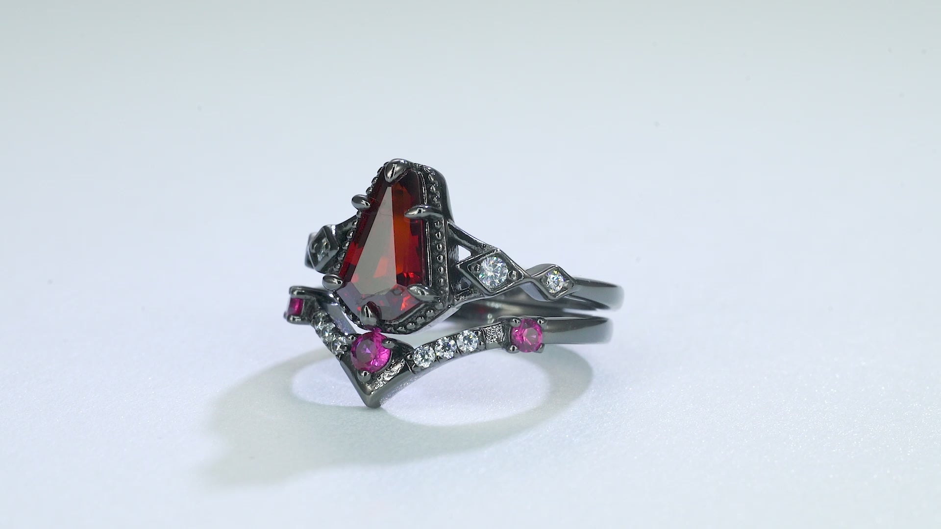 Atra Pink Sapphire and Garnet Ring Set in Black Gold Vermeil