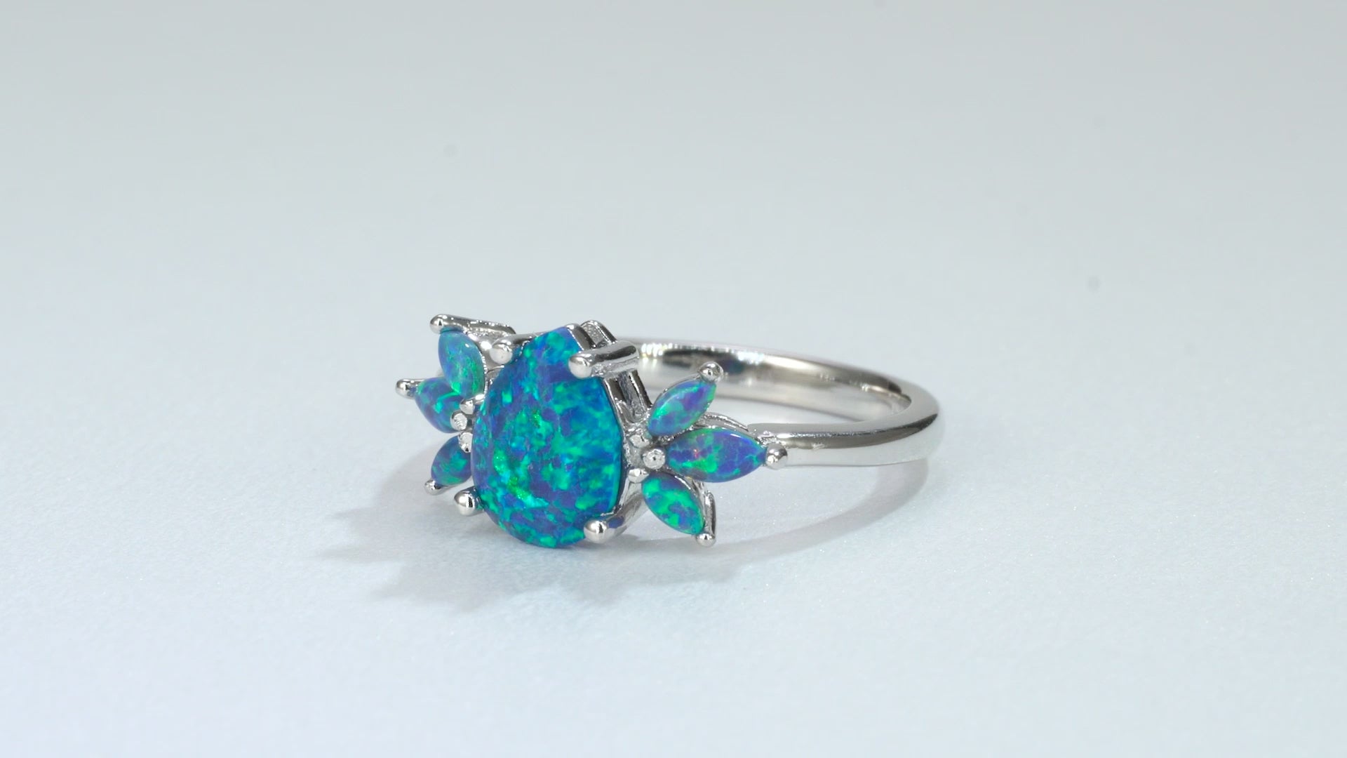 eal fire opal ring with sterling silver band and crystals