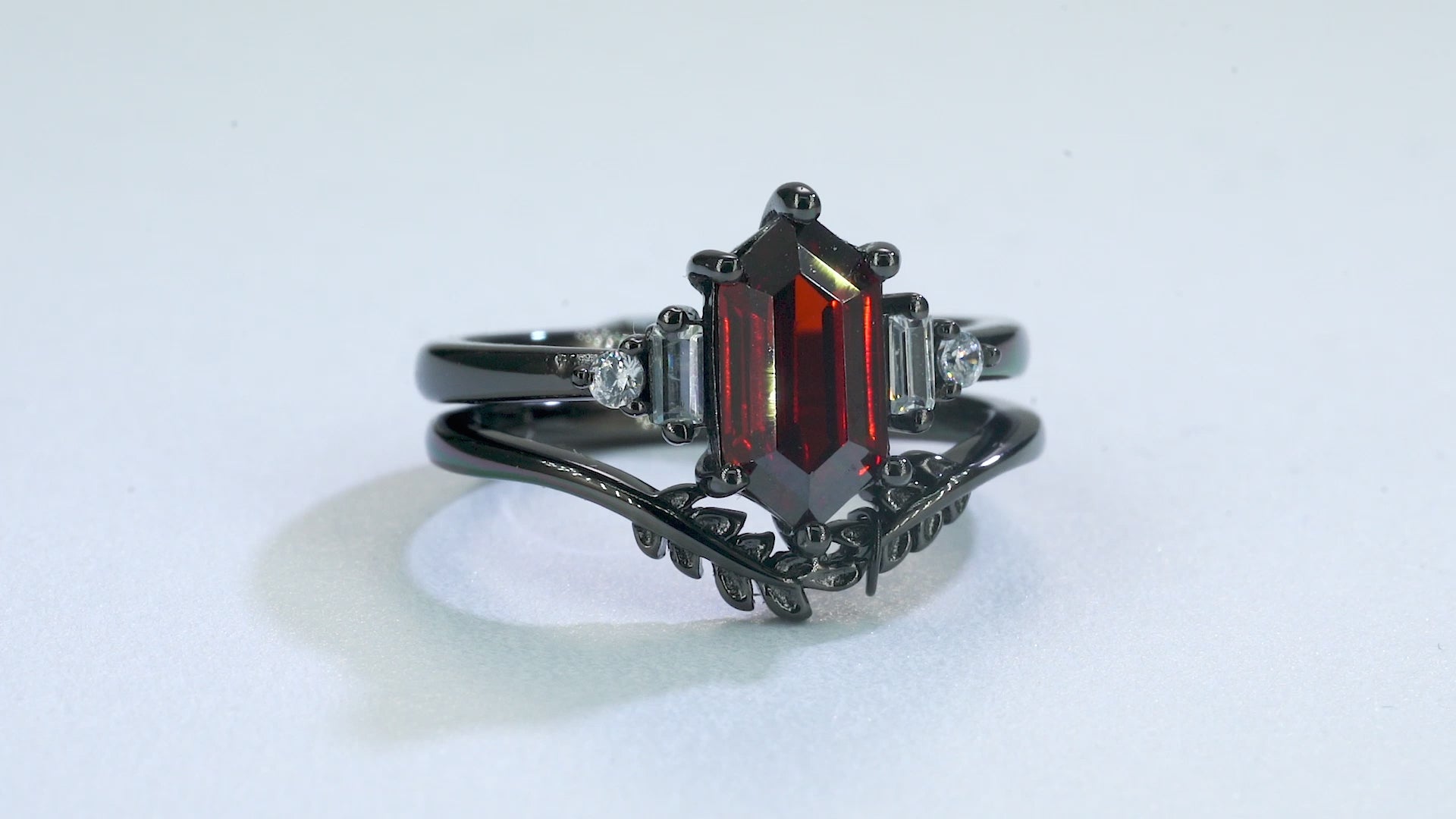Garnet ring with black gold vermeil and gold leaf design