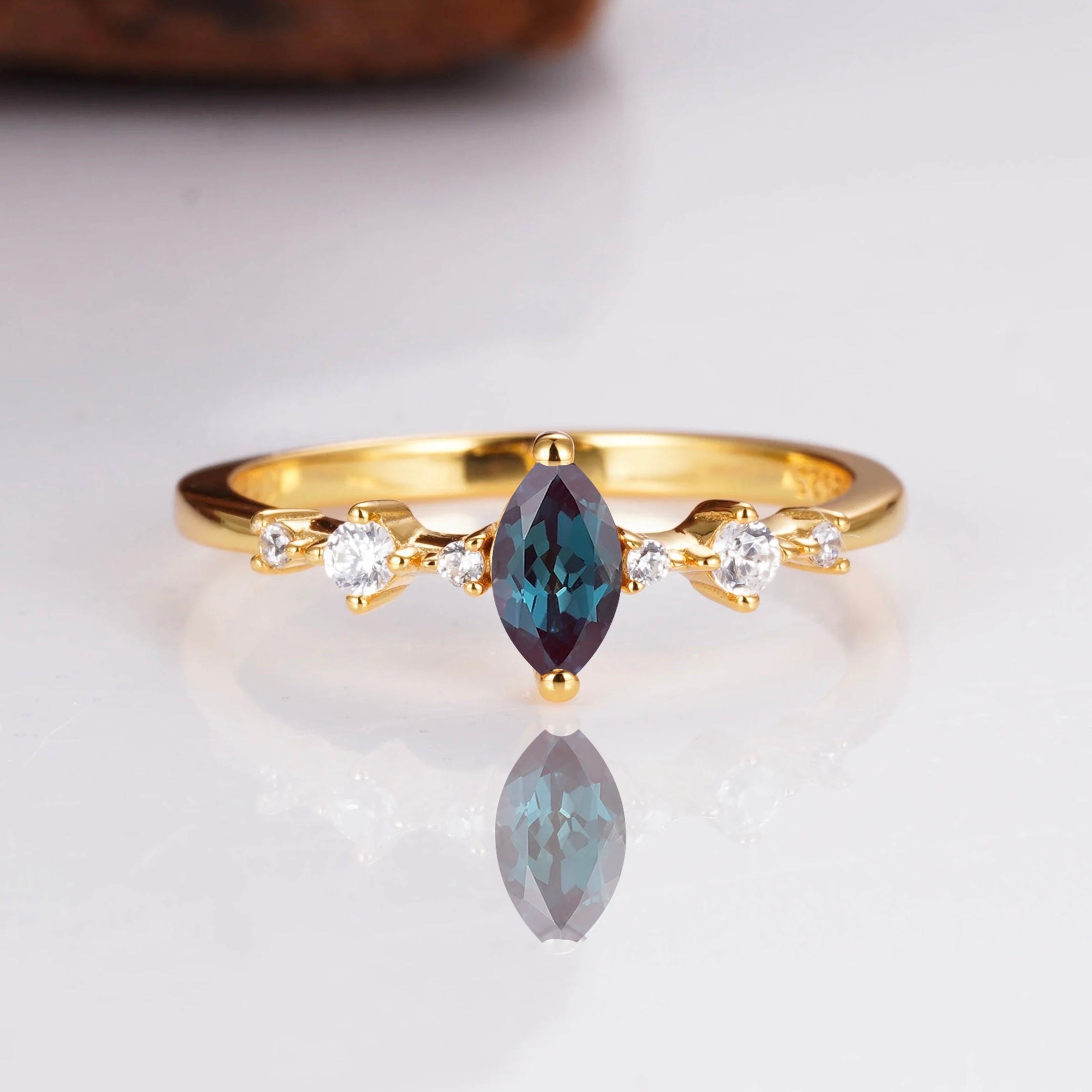 Rose gold alexandrite ring with natural crystal accents