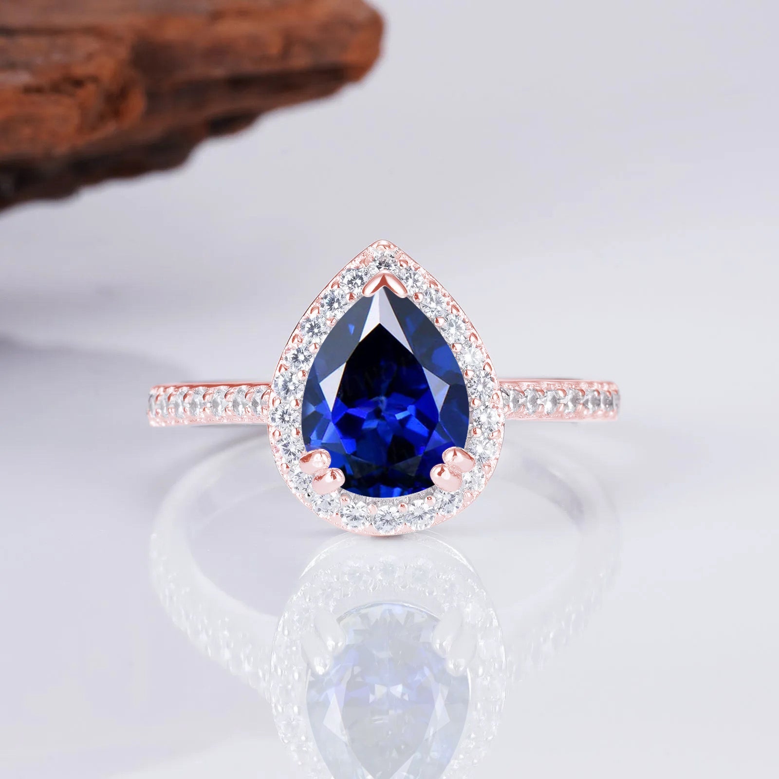 Nia Sapphire Ring with deep blue sapphire and gold band