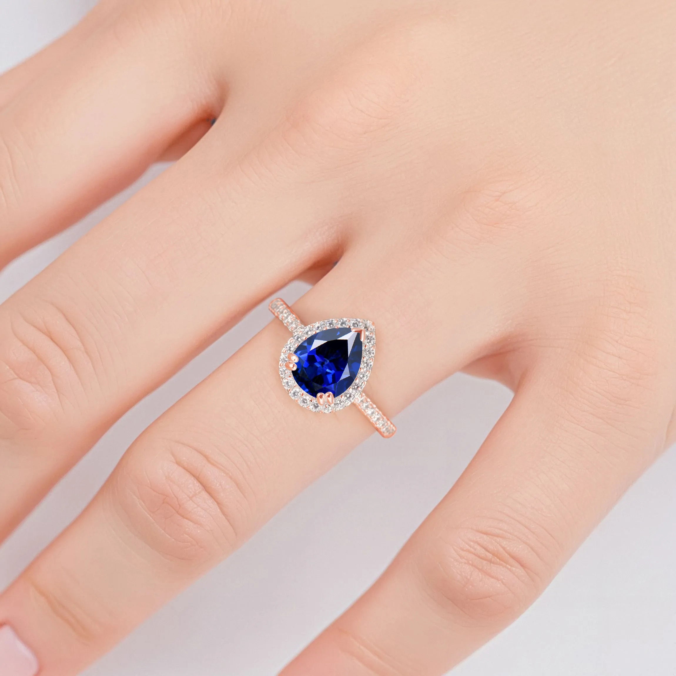 Nia Sapphire Ring with deep blue sapphire and gold band